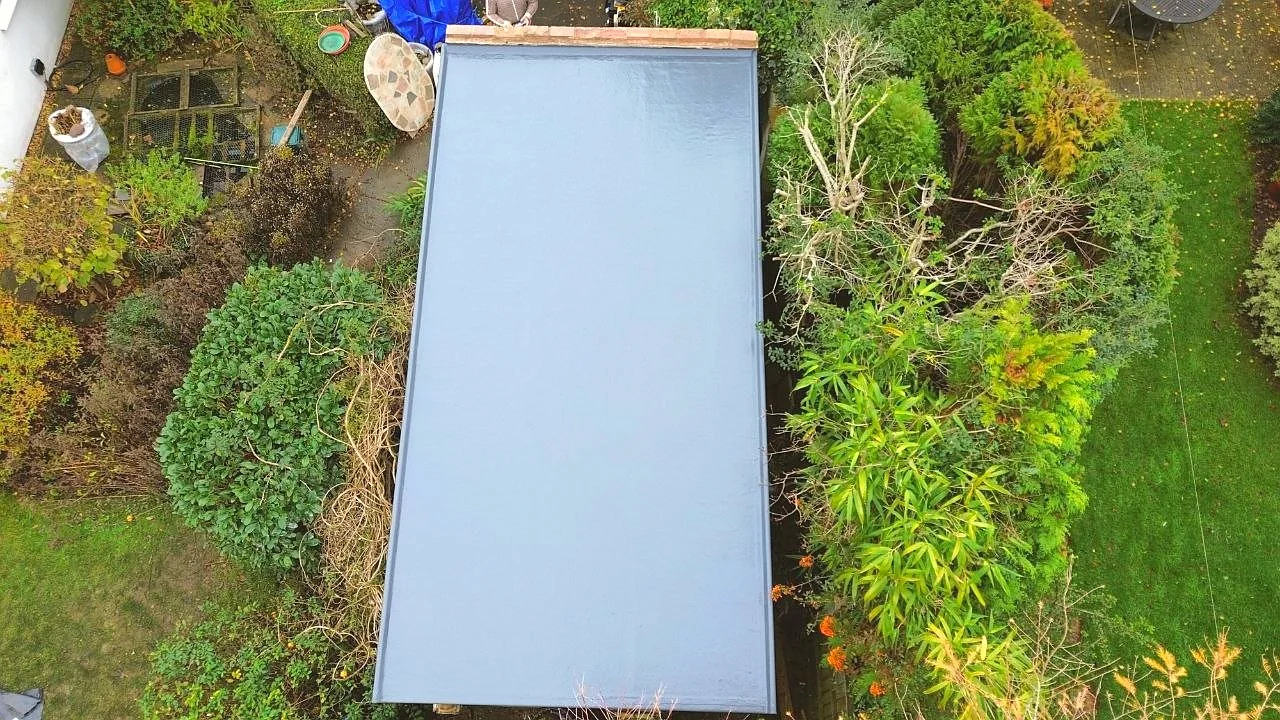 New fibreglass flat roof installation aerial view — flat roof specialists Surrey and SW London