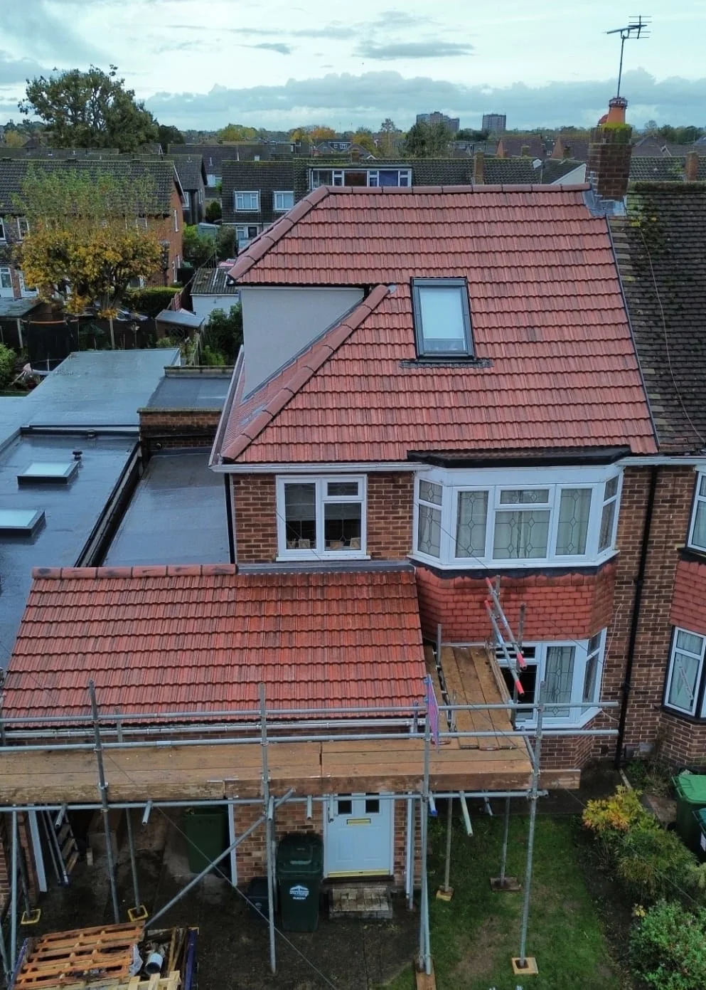 Dormer loft conversion under construction with scaffolding — loft conversion specialists SW London